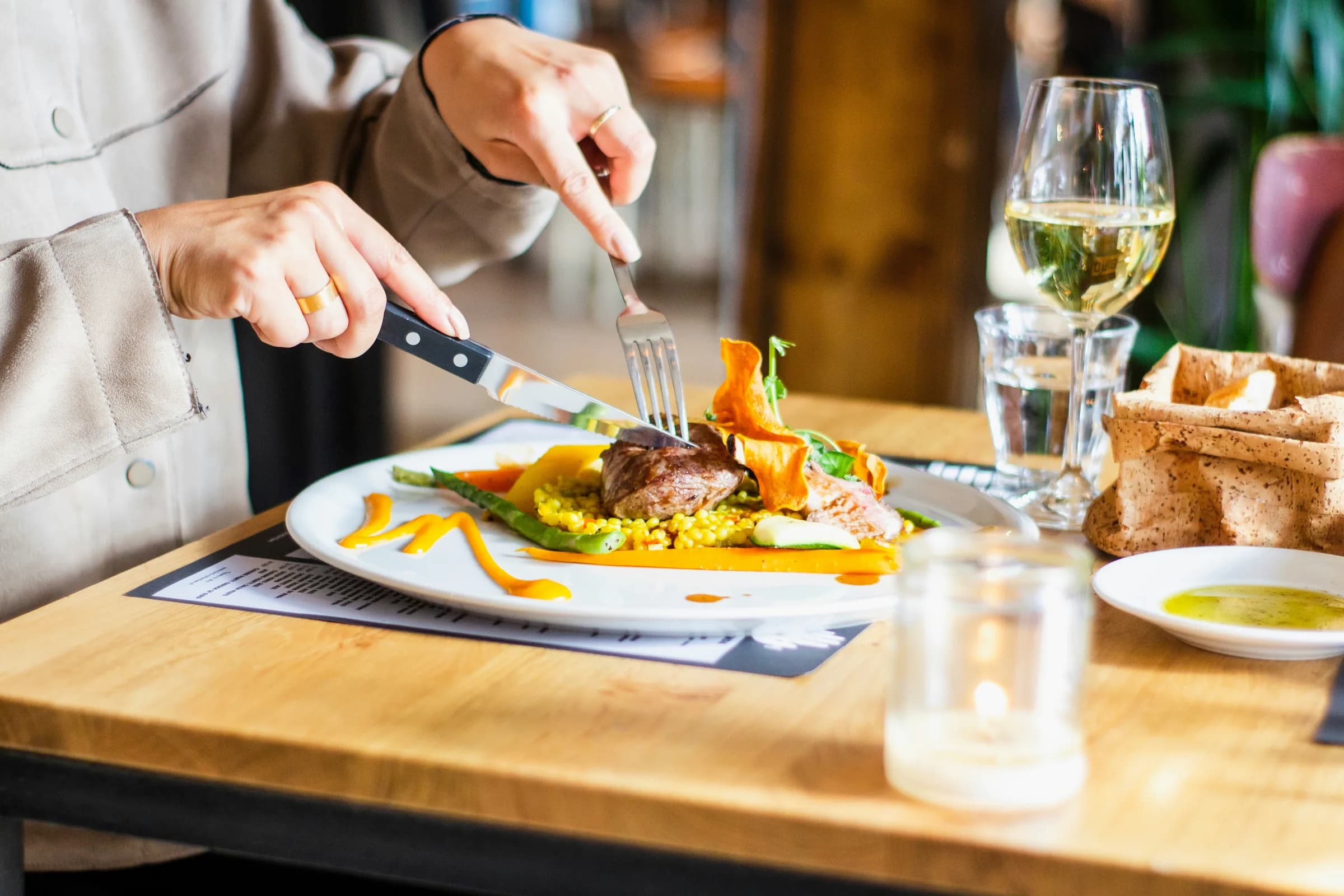 A guest enjoying a plated dish at the cafe